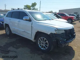 2014 Jeep Grand Cherokee Overland with VIN 1C4RJFCTXEC128443, listed as a IAAI auction lot 40512681 with 126,379 mi miles. Bid and sale history available at carsss.com. Image 6.