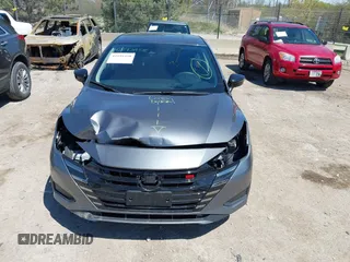 2024 Nissan Versa SR z VIN 3N1CN8FV9RL865083, wystawiony jako IAAI lot #42193458 z przebiegiem 5 774 mil mil oraz . Historia ofert i sprzedaży dostępna na DreamBid. Obrazek 12.