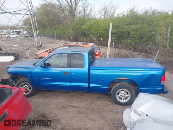 2000 Dodge Dakota with VIN 1B7GL22X8YS774590, listed as a IAAI auction lot 42027035 with 93,092 mi miles and . Bid and sale history available at DreamBid. Image 14.