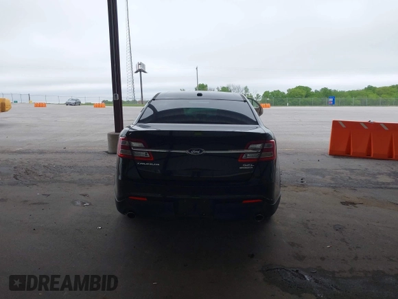 2015 Ford Taurus SEL z VIN 1FAHP2E86FG165100, wystawiony jako IAAI lot #42157272 z przebiegiem 141 846 mil mil oraz . Historia ofert i sprzedaży dostępna na DreamBid. Obrazek 16.