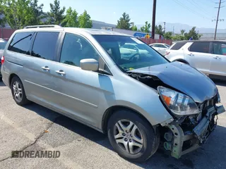 2006 Honda Odyssey EX-L z VIN 5FNRL38786B093362, wystawiony jako IAAI lot #42224098 z przebiegiem 178 578 mil mil oraz . Historia ofert i sprzedaży dostępna na DreamBid. Obrazek 1.