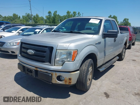 2009 Ford F-150 STX with VIN 1FTRX12W29FA64321, listed as a IAAI auction lot 42653001 with 158,428 mi miles and . Bid and sale history available at DreamBid. Image 2.