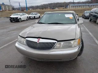 2001 Lincoln Continental with VIN 1LNHM97VX1Y627039, listed as a IAAI auction lot 41482016 with 143,317 mi miles and . Bid and sale history available at DreamBid. Image 12.