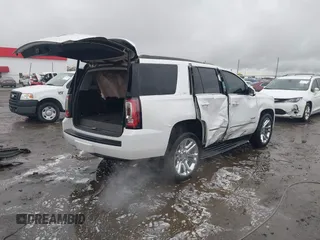 2018 GMC Yukon SLT with VIN 1GKS1BKC8JR392851, listed as a IAAI auction lot 40744741 with 117,028 mi miles. Bid and sale history available at carsss.com. Image 4.