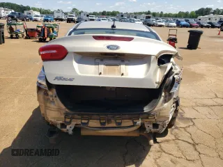 2017 Ford Focus SE with VIN 1FADP3F26HL295581, listed as a Copart auction lot 52158745 with 104,453 mi miles and Salvage title. Bid and sale history available at DreamBid. Image 6.