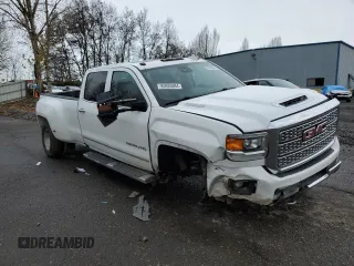 2018 GMC Sierra 3500HD Denali z VIN 1GT42YEY2JF254218, wystawiony jako Copart lot #85935094 z przebiegiem 157 907 mil mil oraz Szkody całkowita. Historia ofert i sprzedaży dostępna na DreamBid. Obrazek 4.
