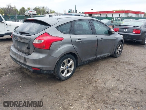 2013 Ford Focus SE with VIN 1FADP3K2XDL121660, listed as a IAAI auction lot 41984336 with 166,295 mi miles. Bid and sale history available at carsss.com. Image 4.