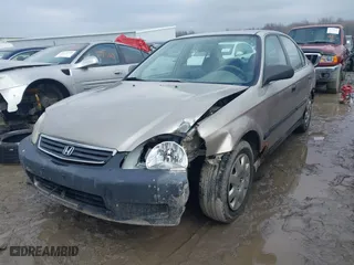 2000 Honda Civic LX with VIN 1HGEJ6671YL013040, listed as a IAAI auction lot 41672641 with 137,016 mi miles. Bid and sale history available at carsss.com. Image 2.