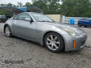 2003 Nissan 350Z Performance z VIN JN1AZ34D33T106988, wystawiony jako Copart lot #57933985 z przebiegiem 203 959 mil mil oraz Szkoda całkowita • Salvage title. Historia ofert i sprzedaży dostępna na DreamBid. Obrazek 4.