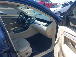 2017 Ford Taurus SEL z VIN 1FAHP2E82HG116530, wystawiony jako IAAI lot #42224056 z przebiegiem 100 946 mil mil oraz . Historia ofert i sprzedaży dostępna na DreamBid. Obrazek 5.