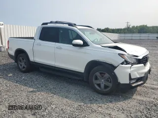 2022 Honda Ridgeline RTL-E with VIN 5FPYK3F70NB006495, listed as a Copart auction lot 57756735 with 43,874 mi miles and Salvage title. Bid and sale history available at DreamBid. Image 4.