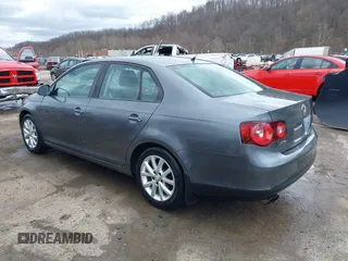 2010 Volkswagen Jetta SE with VIN 3VWRZ7AJ5AM162053, listed as a IAAI auction lot 41811153 with 141,988 mi miles and . Bid and sale history available at DreamBid. Image 3.