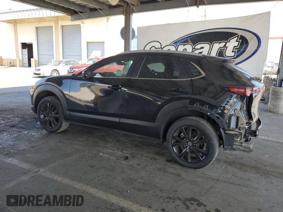 2024 Mazda CX-30 S Select Sport with VIN 3MVDMBBM8RM658675, listed as a Copart auction lot 61963635 with 8,497 mi miles and Salvage title. Bid and sale history available at DreamBid. Image 2.