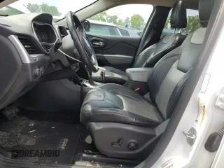 2014 Jeep Cherokee Limited with VIN 1C4PJLDB1EW301647, listed as a Copart auction lot 56169585 with 140,784 mi miles and Salvage title. Bid and sale history available at DreamBid. Image 7.