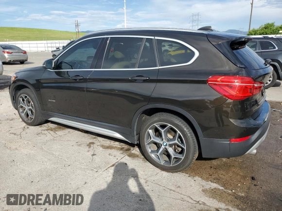 2017 BMW X1 xDrive28i with VIN WBXHT3C32H5F71690, listed as a Copart auction lot 60852375 with 67,475 mi miles and Salvage title. Bid and sale history available at DreamBid. Image 2.