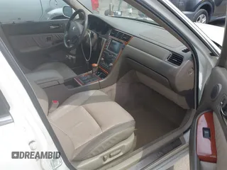 2004 Acura RL w/Navigation System z VIN JH4KA966X4C001584, wystawiony jako IAAI lot #42429042 z przebiegiem 290 258 mil mil oraz . Historia ofert i sprzedaży dostępna na DreamBid. Obrazek 5.