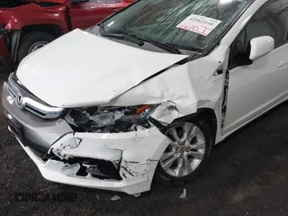 2012 Honda Insight EX with VIN JHMZE2H71CS003132, listed as a IAAI auction lot 42582548 with 112,593 mi miles and . Bid and sale history available at DreamBid. Image 6.