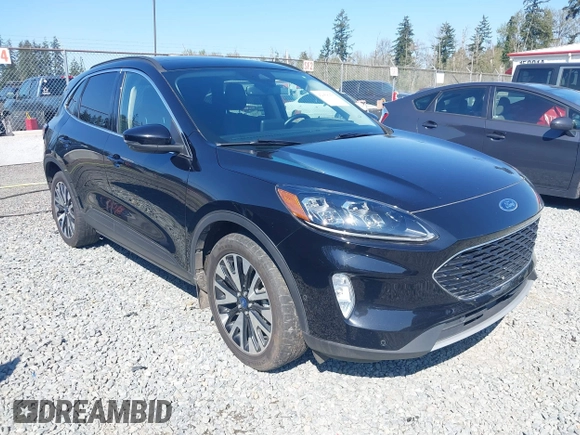 2020 Ford Escape Titanium Hybrid z VIN 1FMCU9DZ9LUC35844, wystawiony jako IAAI lot #42058275 z przebiegiem 74 205 mil mil oraz . Historia ofert i sprzedaży dostępna na DreamBid. Obrazek 1.