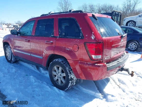 2010 Jeep Grand Cherokee Laredo with VIN 1J4RR4GT0AC135770, listed as a IAAI auction lot 41444149 with 226,746 mi miles. Bid and sale history available at carsss.com. Image 3.