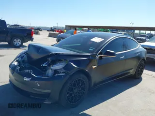 2020 Tesla Model 3 Standard Range Plus with VIN 5YJ3E1EA0LF597761, listed as a IAAI auction lot 41773918 with 89,957 mi miles. Bid and sale history available at carsss.com. Image 19.