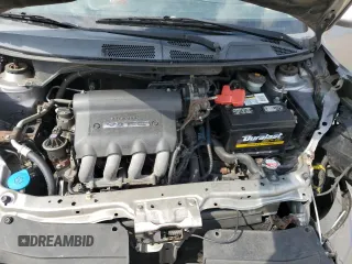 2007 Honda Fit Sport z VIN JHMGD38657S035465, wystawiony jako Copart lot #57635245 z przebiegiem 184 627 mil mil oraz Szkoda całkowita • Salvage title. Historia ofert i sprzedaży dostępna na DreamBid. Obrazek 11.