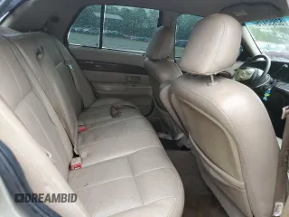 2003 Mercury Grand Marquis GS Convenience z VIN 2MEFM74W53X702387, wystawiony jako Copart lot #52852475 z przebiegiem 246 543 mil mil oraz Szkoda całkowita • Salvage title. Historia ofert i sprzedaży dostępna na DreamBid. Obrazek 10.