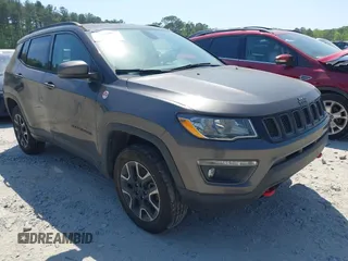 2020 Jeep Compass Trailhawk with VIN 3C4NJDDB4LT166907, listed as a IAAI auction lot 42071993 with 53,977 mi miles and . Bid and sale history available at carsss.com. Image 1.