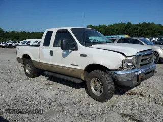 2000 Ford F-250 XL with VIN 1FTNX21F3YEB32295, listed as a Copart auction lot 60867745 with 329,194 mi miles and Salvage title. Bid and sale history available at DreamBid. Image 4.