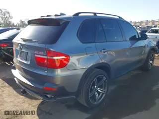 2009 BMW X5 30i with VIN 5UXFE43559L263332, listed as a IAAI auction lot 41998651 with 209,264 mi miles. Bid and sale history available at carsss.com. Image 4.