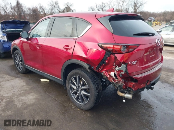 2018 Mazda CX-5 Grand Touring with VIN JM3KFBDM8J0406276, listed as a IAAI auction lot 41447355 with 70,772 mi miles. Bid and sale history available at carsss.com. Image 3.