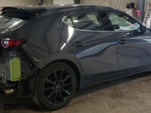 2021 Mazda 3 Premium Plus with VIN JM1BPBNYXM1311594, listed as a Copart auction lot 61470625 with 89,254 mi miles and Salvage title. Bid and sale history available at DreamBid. Image 3.