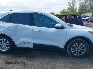 2021 Ford Escape SE z VIN 1FMCU0G60MUB22668, wystawiony jako IAAI lot #42213083 z przebiegiem 25 159 mil mil oraz . Historia ofert i sprzedaży dostępna na DreamBid. Obrazek 13.
