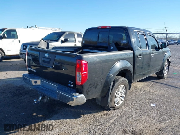 2019 Nissan Frontier SV with VIN 1N6DD0ER6KN767674, listed as a IAAI auction lot 41742210 with 73,238 mi miles and . Bid and sale history available at DreamBid. Image 4.