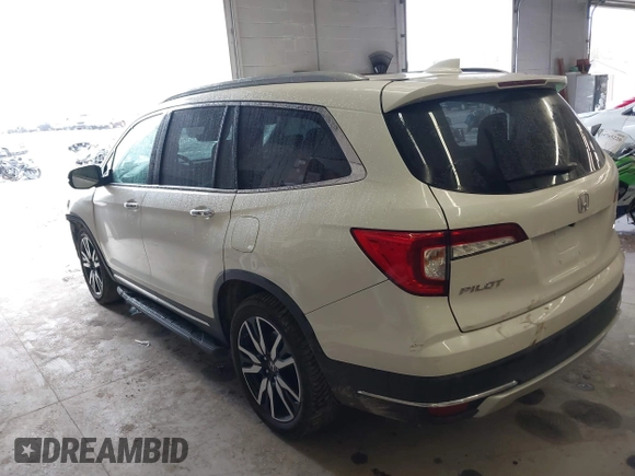 2019 Honda Pilot Elite with VIN 5FNYF6H08KB054725, listed as a IAAI auction lot 40496860 with 91,284 mi miles and . Bid and sale history available at DreamBid. Image 3.