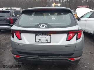 2022 Hyundai Tucson SE with VIN 5NMJA3AEXNH069489, listed as a IAAI auction lot 41520347 with 100,657 mi miles. Bid and sale history available at carsss.com. Image 16.
