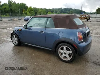 2009 MINI Convertible with VIN WMWMR33579TU96147, listed as a Copart auction lot 60124945 with 94,612 mi miles and Non repairable. Bid and sale history available at DreamBid. Image 2.