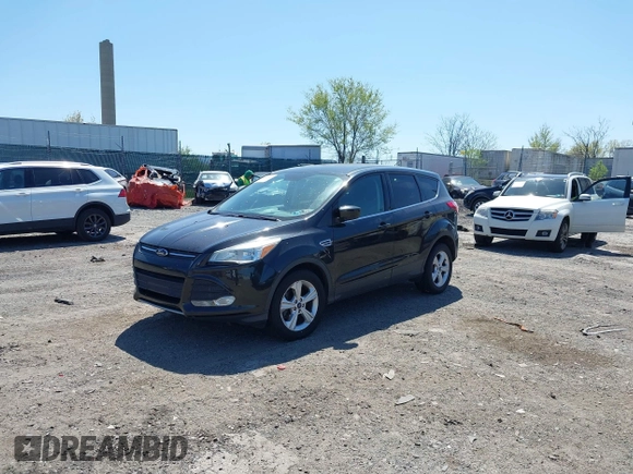 2015 Ford Escape SE with VIN 1FMCU9GX3FUC14020, listed as a IAAI auction lot 42069921 with 111,113 mi miles. Bid and sale history available at carsss.com. Image 2.