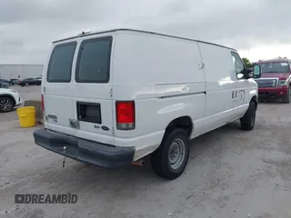 2013 Ford Econoline Cargo Commercial with VIN 1FTNE2EW9DDB02704, listed as a IAAI auction lot 42596289 with 243,629 mi miles and . Bid and sale history available at DreamBid. Image 4.