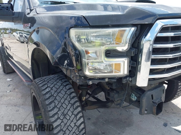 2015 Ford F-150 XLT with VIN 1FTEW1C81FFB05261, listed as a IAAI auction lot 42193554 with Not Provided miles and . Bid and sale history available at carsss.com. Image 20.