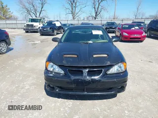 2004 Pontiac Grand Am GT with VIN 1G2NW52E74M683389, listed as a IAAI auction lot 41810159 with 227,091 mi miles. Bid and sale history available at carsss.com. Image 13.