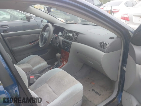 2007 Toyota Corolla CE z VIN JTDBR32E670100350, wystawiony jako IAAI lot #42233353 z przebiegiem 152 848 mil mil oraz . Historia ofert i sprzedaży dostępna na DreamBid. Obrazek 5.