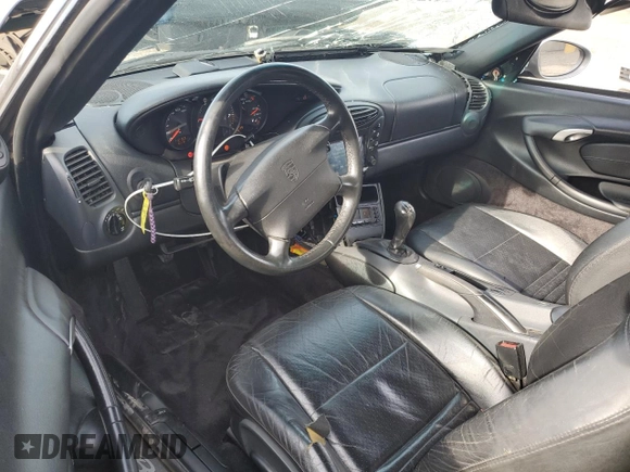 2000 Porsche Boxster z VIN WP0CA2984YU627674, wystawiony jako Copart lot #86027054 z przebiegiem 112 153 mil mil oraz Szkoda całkowita • Salvage title. Historia ofert i sprzedaży dostępna na DreamBid. Obrazek 8.