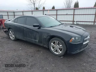 2014 Dodge Charger RT Plus with VIN 2C3CDXDT4EH372012, listed as a IAAI auction lot 41654241 with 177,960 mi miles. Bid and sale history available at carsss.com. Image 1.