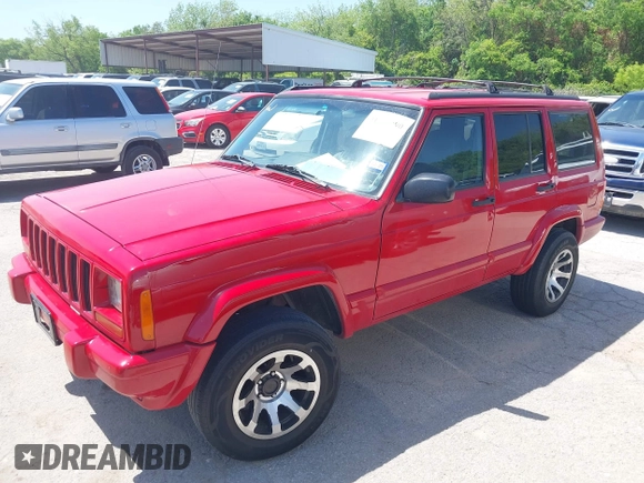 1998 Jeep Cherokee Sport with VIN 1J4FT68S2WL256846, listed as a IAAI auction lot 41998490 with 198,936 mi miles. Bid and sale history available at carsss.com. Image 2.