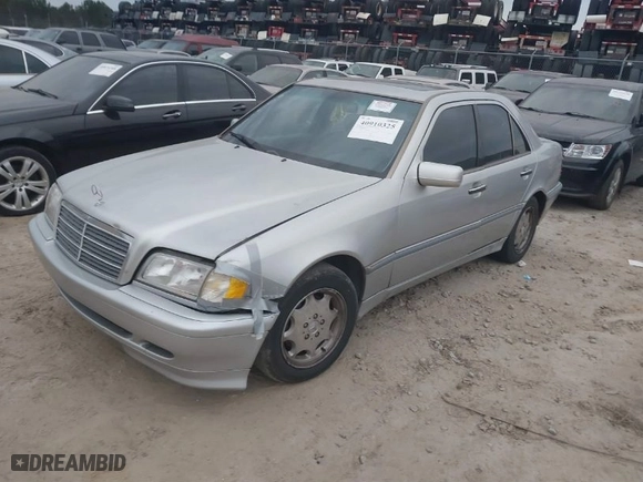 1998 Mercedes-Benz C-Class with VIN WDBHA29G6WA606173, listed as a IAAI auction lot 40910325 with NaN miles. Bid and sale history available at carsss.com. Image 2.