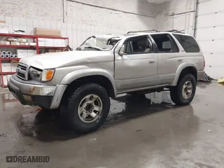 1998 Toyota 4Runner Limited with VIN JT3HN87R0W0189219, listed as a IAAI auction lot 41815288 with 227,784 mi miles. Bid and sale history available at carsss.com. Image 2.