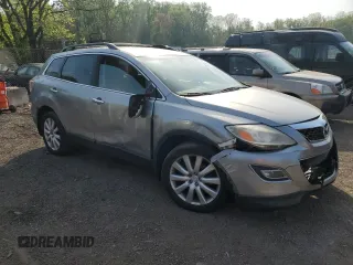 2010 Mazda CX-9 Grand Touring z VIN JM3TB3MA9A0220094, wystawiony jako Copart lot #53611025 z przebiegiem 163 870 mil mil oraz Szkoda całkowita • Salvage title. Historia ofert i sprzedaży dostępna na DreamBid. Obrazek 4.
