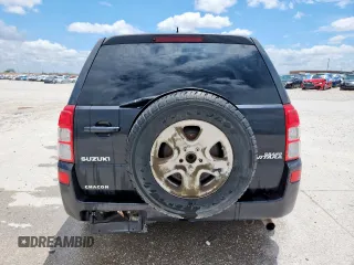 2008 Suzuki Grand Vitara with VIN JS3TE941284104419, listed as a Copart auction lot 63089375 with 216,057 mi miles and Salvage title. Bid and sale history available at DreamBid. Image 6.