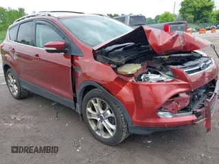 2015 Ford Escape Titanium with VIN 1FMCU9J98FUC84963, listed as a IAAI auction lot 42469112 with 128,838 mi miles and . Bid and sale history available at DreamBid. Image 1.