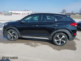 2017 Hyundai Tucson Value with VIN KM8J33A25HU586191, listed as a IAAI auction lot 41682127 with 58,877 mi miles. Bid and sale history available at carsss.com. Image 14.